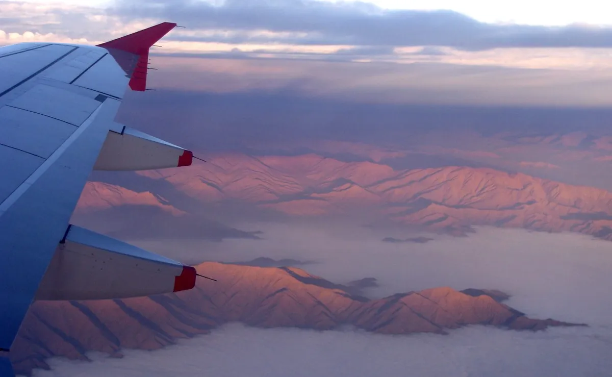 Flying over the foothills near Lima, Peru. Photo by Julia Manzerova, flickr.com.