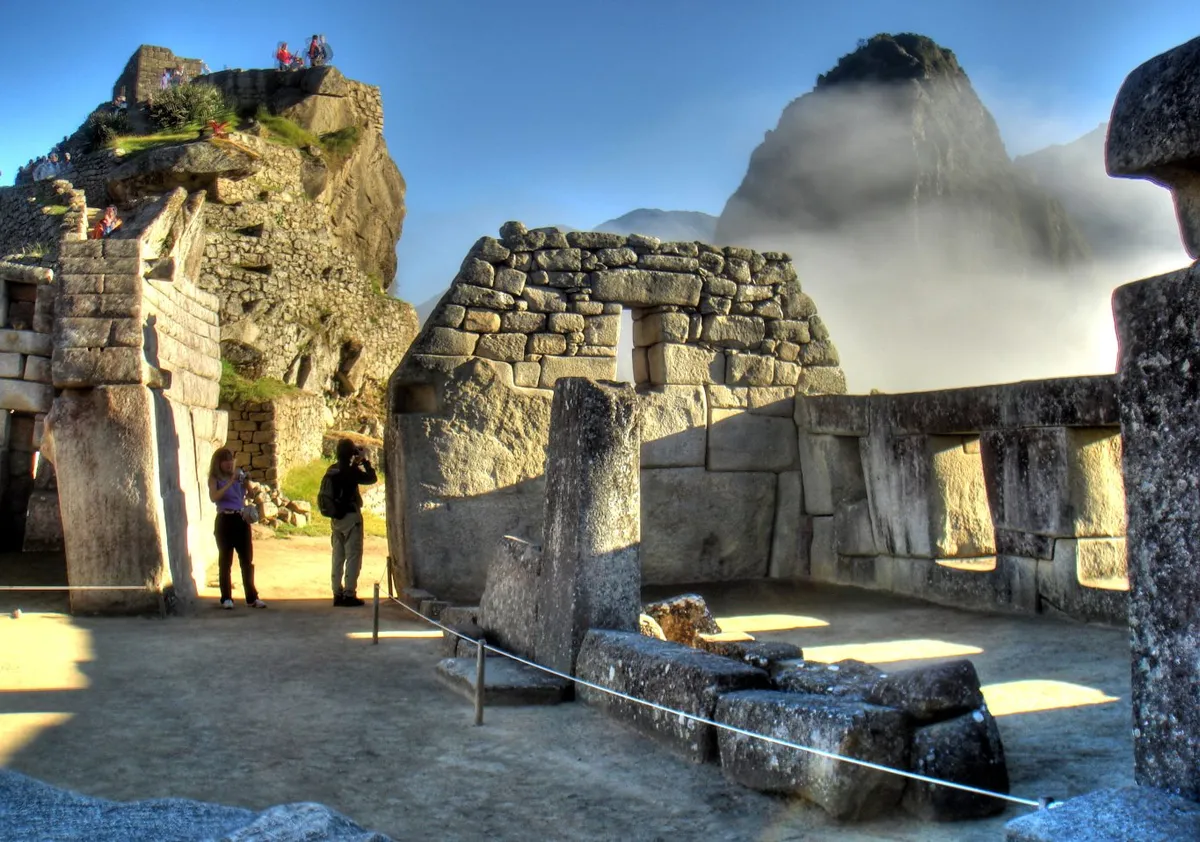 Inside Machu Picchu as the sun rises