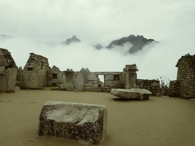 The Temple of three windows of Machu Picchu at the end of the rainy season